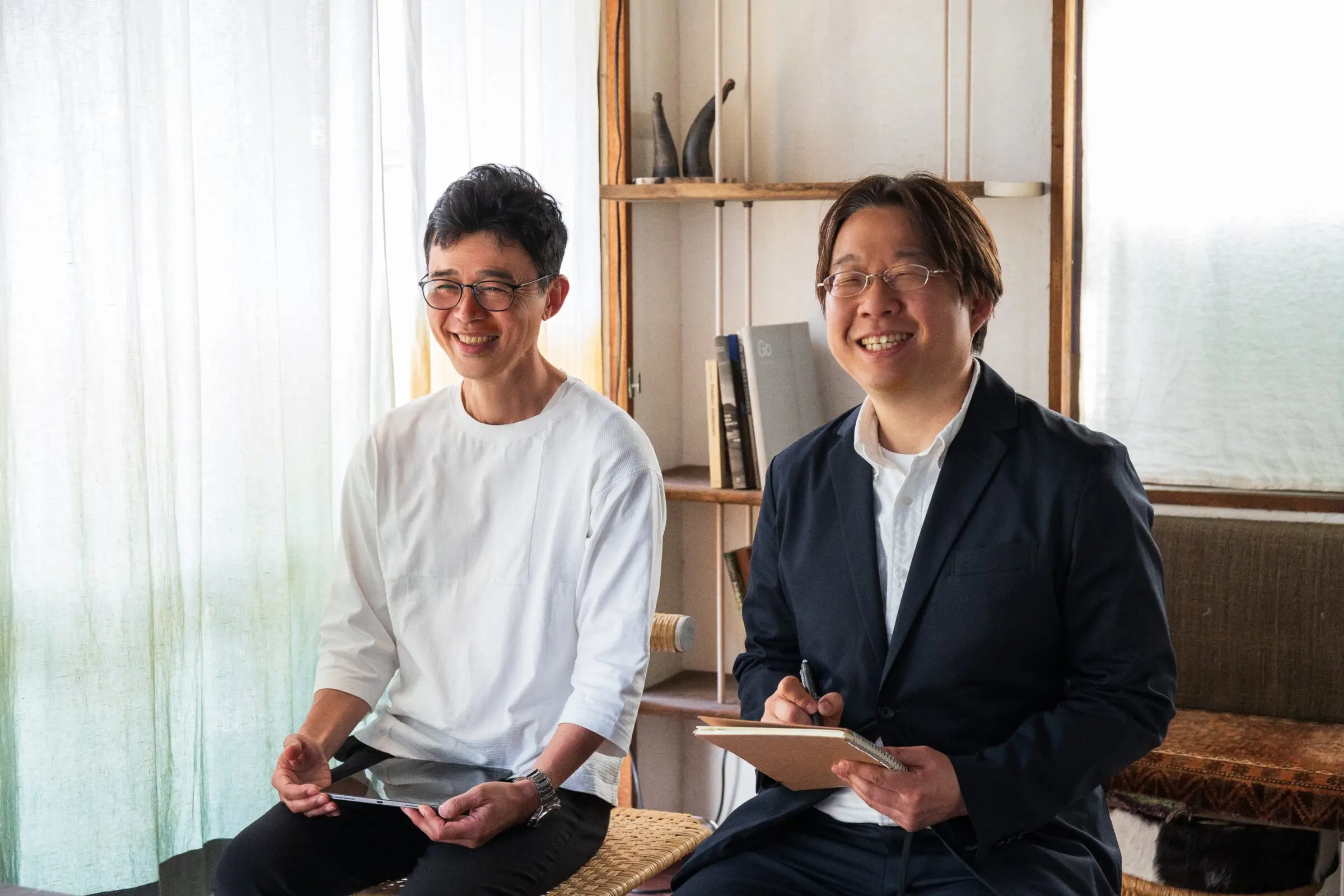塚田栄一と角間実によるヒアリングの様子