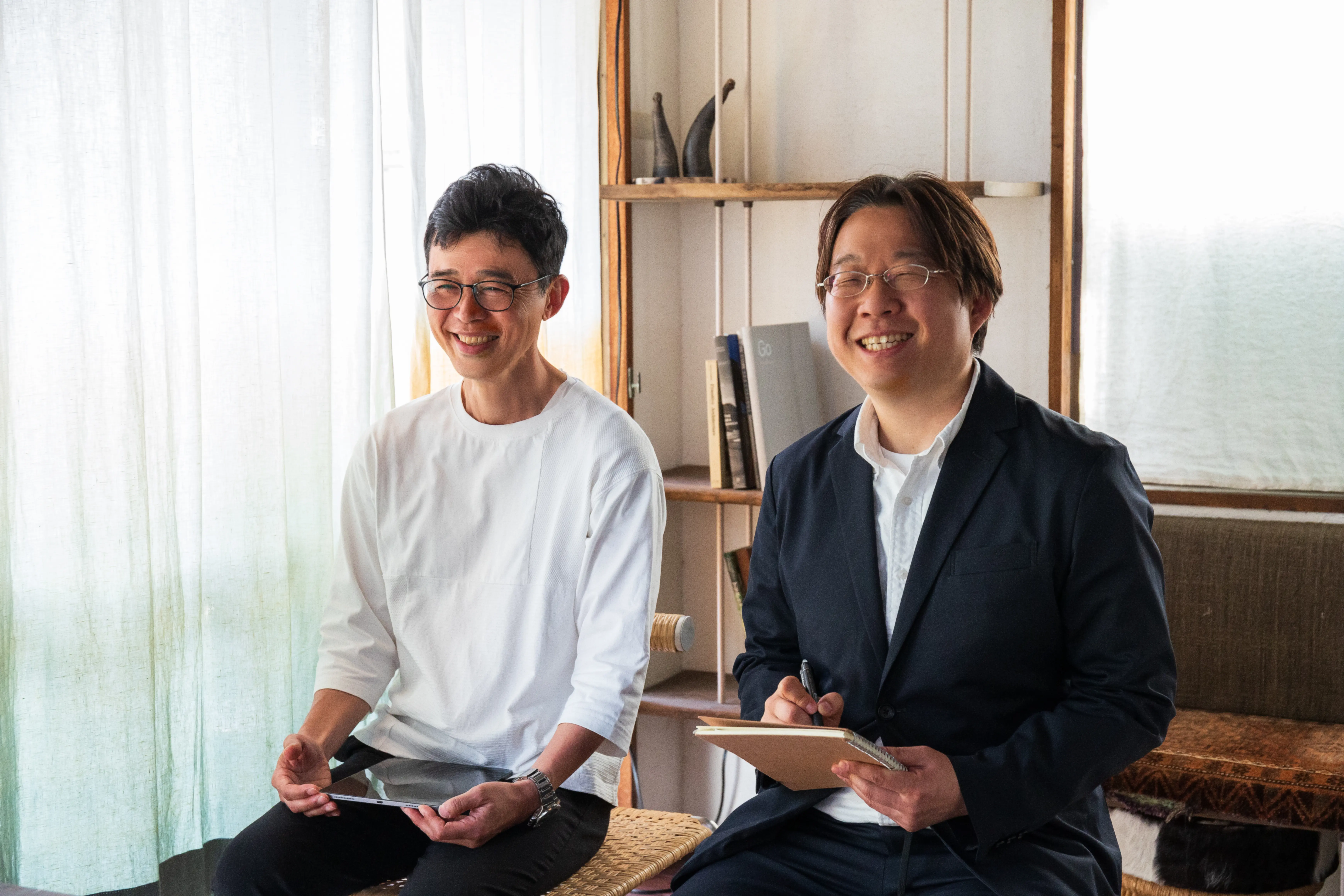 塚田栄一と角間実によるヒアリングの様子